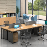 Modular office workstation desk with ergonomic chairs for corporate offices.